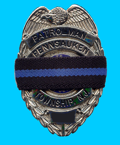 Badge in Memoriam